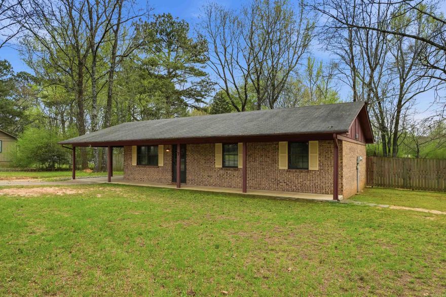 Welcome to your peaceful slice of country living! This beautifully maintained 3-bedroom, 1.5-bath home sits on a spacious half-acre lot, offering the perfect blend of comfort, charm, and functionality.  Step inside to find a warm and inviting interior featuring a mix of tile and wood flooring throughout—both stylish and easy to maintain. The thoughtfully designed layout provides comfortable living spaces, ideal for both relaxing evenings and everyday living.  Outdoors, this property truly shines. Enjoy your morning coffee or evening gatherings on the large covered screened-in back porch overlooking the expansive backyard with large mature trees. Gardening enthusiasts will love the established garden filled with herbs and flowers, while the chicken coop adds a delightful homesteading touch.  With plenty of room to roam, grow, and unwind, this property offers a unique opportunity to enjoy a quieter lifestyle without sacrificing modern comforts.  Don’t miss your chance to own this charming, nature-filled retreat—schedule your showing today!