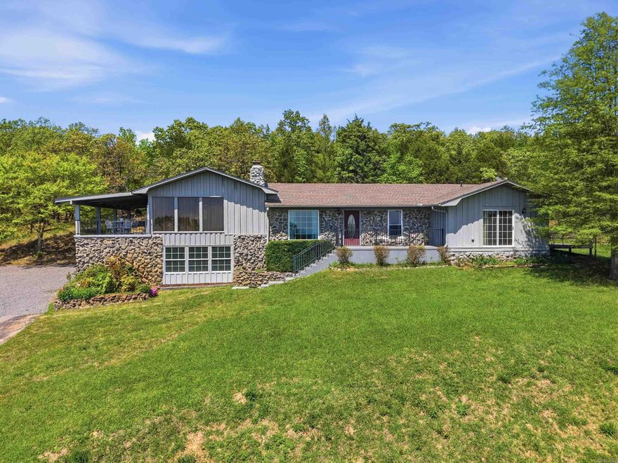 Tucked high above the trees within Conway city limits, this hidden gem offers privacy, space, and breathtaking views you won’t find anywhere else. This stunning 3-bedroom, 2.5-bath home is designed for both comfort and versatility, featuring a formal living area, a spacious den/family room, and a bright sunroom perfect for soaking in the natural surroundings. You’ll love the large flex room with additional storage downstairs —ideal for a hobby space or anything you can dream up. Step outside to enjoy the upper-level covered patio, where you can relax and take in the incredible panoramic views. The outdoor amenities continue with a deck, charming gazebo, and five acres of beautiful land, complete with trails winding through peaceful, cleared areas. They say you can’t put a price on a view—but this one proves otherwise. Don’t miss your chance to experience this one-of-a-kind property that feels like a private retreat while still being conveniently located in the heart of Conway on all Conway Corp Utilities. This homes checks every box!