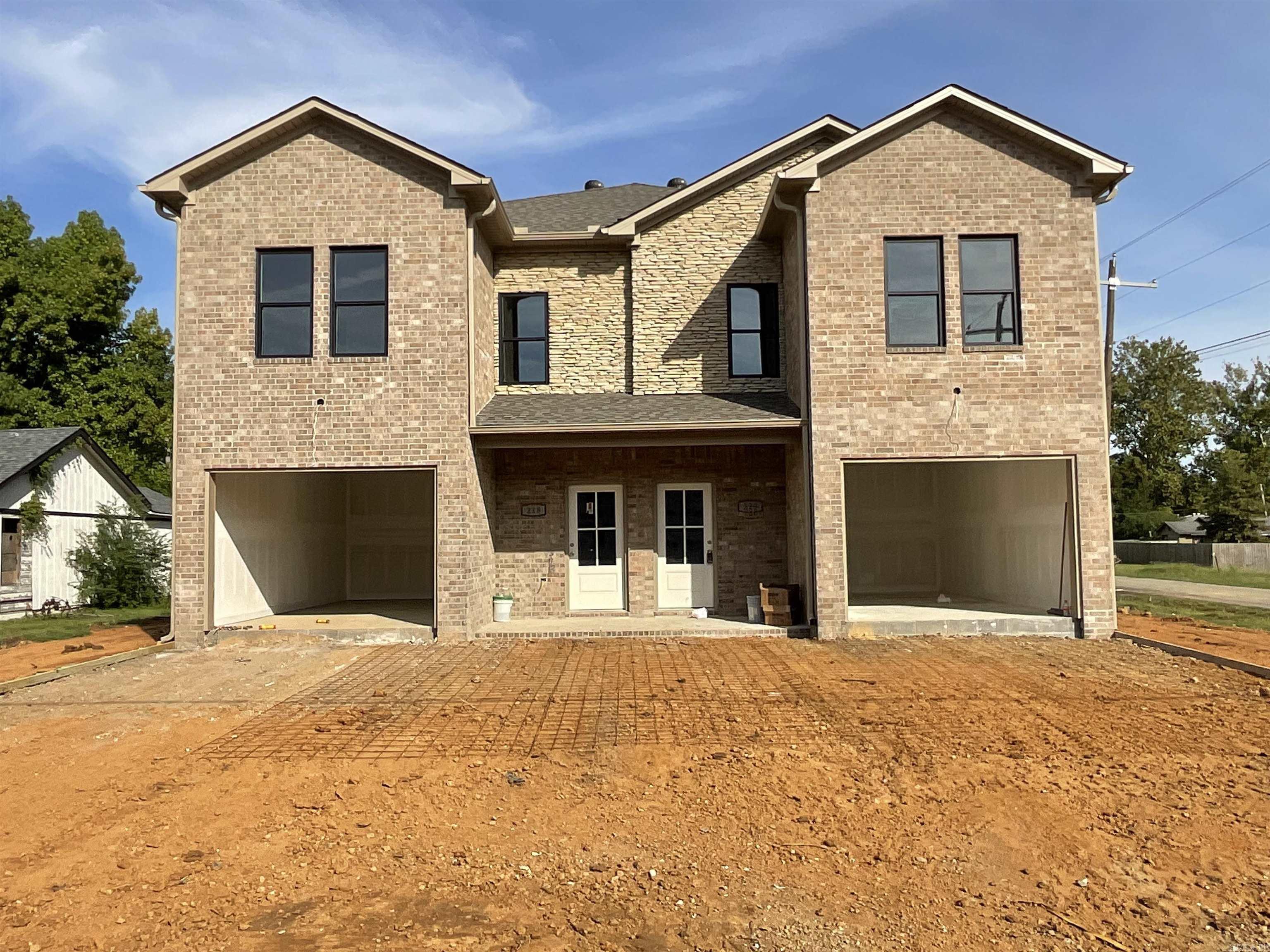 Investment Powerhouse right down the road from Little Rock Air Force Base and a 15 min drive from downtown Little Rock! ALL BRICK/stone NEW CONSTRUCTION DUPLEXES in the heart of Jacksonville! Each unit is 3bed/2 1/2 bath! One car garage opens into the downstairs spacious living area with a half bath for convenience. Upstairs contains primary bedroom at the back with its own bathroom and walk-in closet. The two additional bedrooms have a Jack-and-Jill bathroom between them. Hall laundry makes for the ultimate in convenience! Luxury vinyl throughout and beautiful finishes make this renter-ready! SEE AGENT REMARKS!
