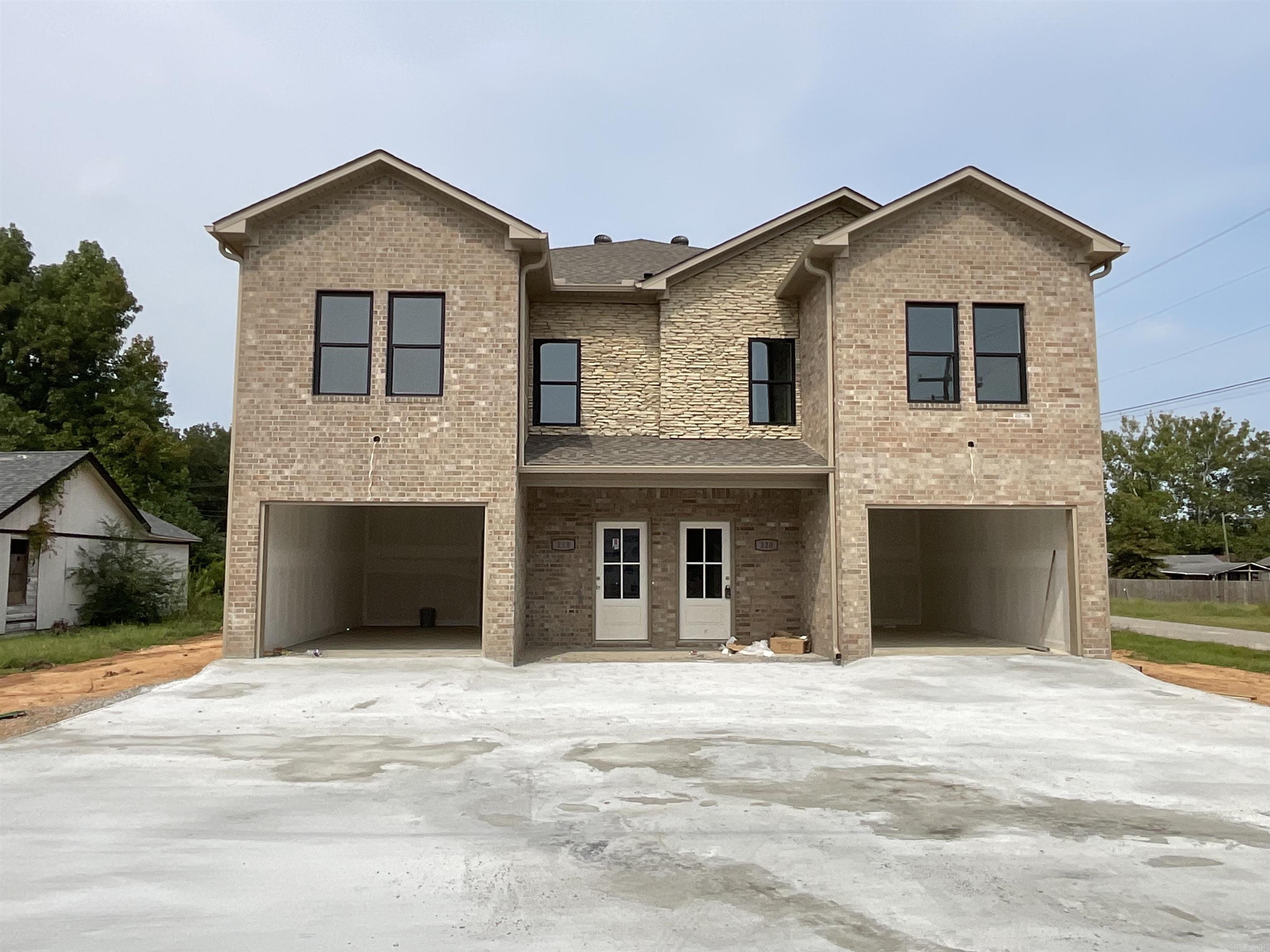 Investment Powerhouse right down the road from Little Rock Air Force Base and a 15 min drive from downtown Little Rock! ALL BRICK/stone NEW CONSTRUCTION DUPLEXES in the heart of Jacksonville! Each unit is 3bed/2 1/2 bath! One car garage opens into the downstairs spacious living area with a half bath for convenience. Upstairs contains primary bedroom at the back with its own bathroom and walk-in closet. The two additional bedrooms have a Jack-and-Jill bathroom between them. Hall laundry makes for the ultimate in convenience! Luxury vinyl throughout and beautiful finishes make this renter-ready! SEE AGENT REMARKS!
