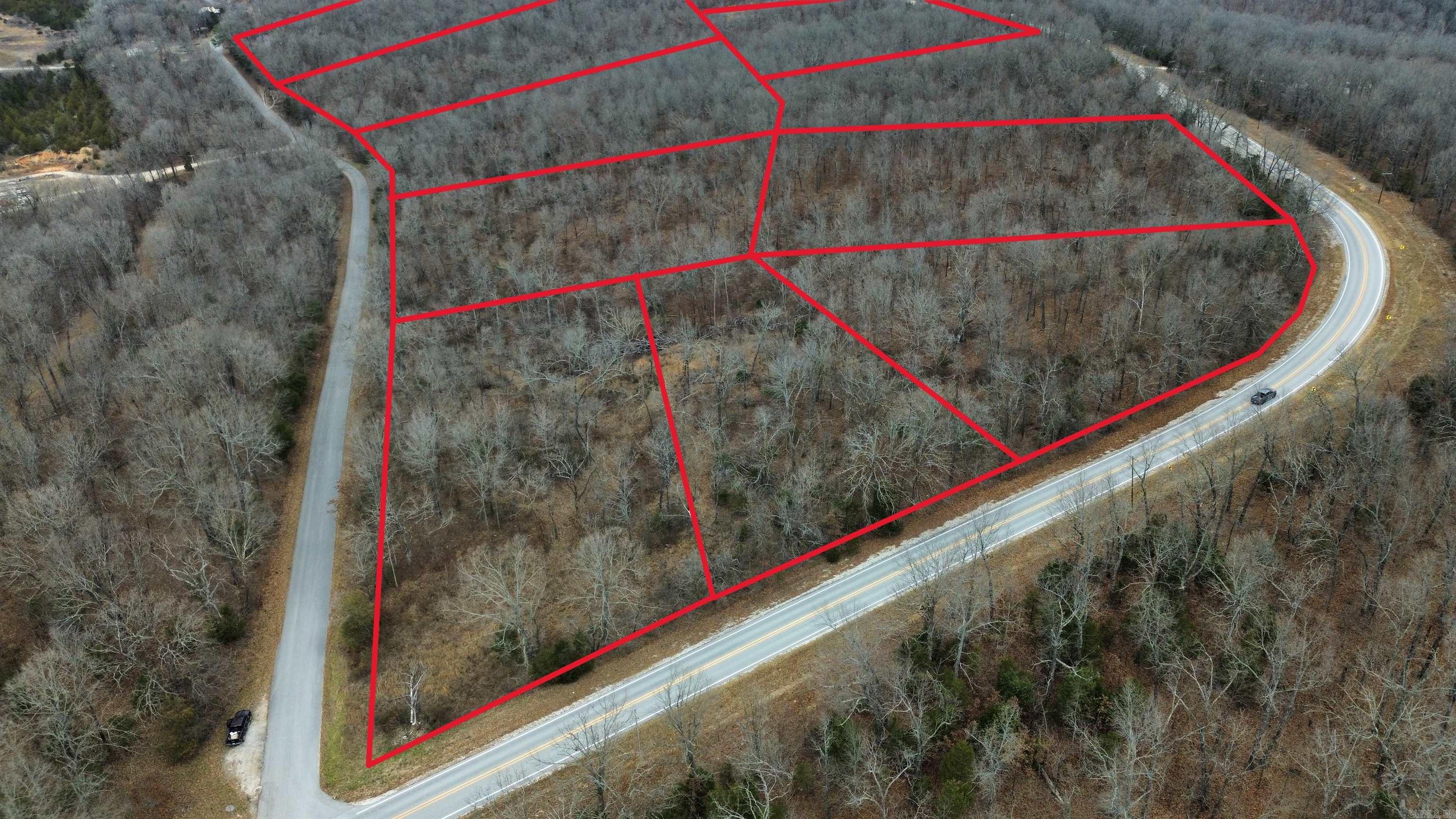 Looking for the perfect pieces of land in Horseshoe Bend, Arkansas? Lot 17, consisting of 2.93 acres and Lot 18 at 3.08 acres, these recreational lots reside in the Crown Lake Estates. They offer excellent opportunities for those seeking a beautiful home site, vacation retreat, or smart investment property. Priced at $29,500, these spacious lots boast road frontage off AR-289 N with city water, electric, and sewer readily available, making it easy to develop. Situated in the heart of the Ozark Mountains, Horseshoe Bend is a sought-after destination known for its natural beauty, outdoor recreation, and peaceful lifestyle. With Crown Lake just minutes away, residents can enjoy boating, fishing, and water sports on this stunning 640-acre lake. The area is also home to the Turkey Mountain Golf Course, an 18-hole championship course that attracts golf enthusiasts from across the region. For those who love the great outdoors, the Strawberry River offers excellent fishing and canoeing, providing endless opportunities for adventure. These lots are just two of several available. For more information, contact me today! Learn more about the area: Arkansas.com/HorseshoeBend