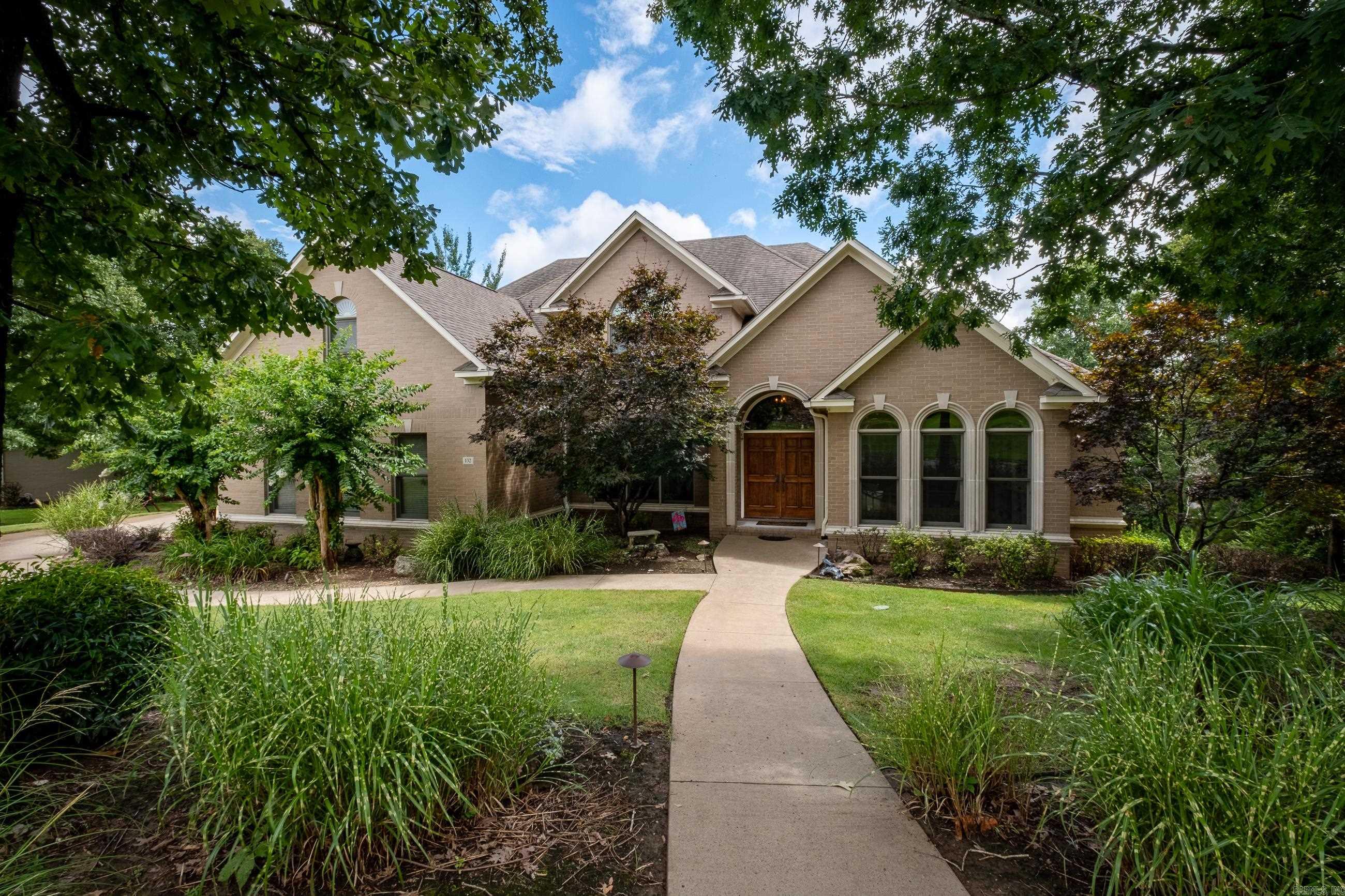 Welcome to 132 Noyant, a spacious, 5-bedroom 4.5-bathroom home in the popular LaMarche neighborhood! Beautiful, hardwood flooring throughout the main level with a formal living and dining room, inviting family room that opens to the kitchen and a separate office with French doors. On the main level there is a large, primary bedroom with sitting area and bathroom with walk-in closets. A media room or in-law suite with a wet bar, downstairs. 3 bedrooms, 2 bathrooms and a unique soundproof workout or music space can be found upstairs. Main living areas are wired with surround sound. The yard features an invisible fence and beautiful trees with two separate outdoor living areas to enjoy the quiet as well as providing a safe place for pets. Spacious 3- car garage with built-in storage is great to keep things organized and easily accessible. This impressive home is perfect for entertaining or large families!