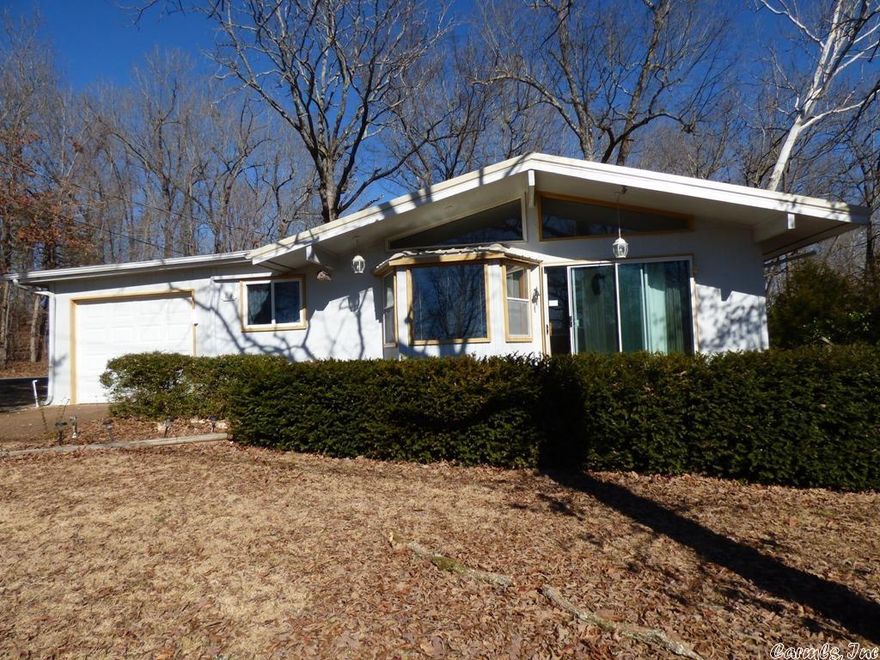 Across from North Golf Course, 2 bedroom, 1 and 1/2 bath with a bonus room. 1 car garage and storage.