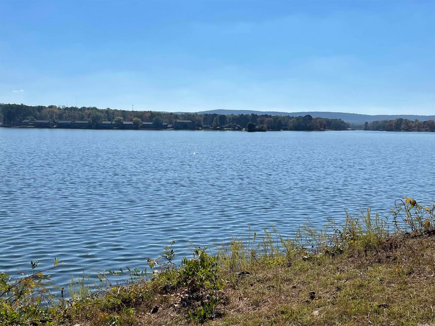 One of the most beautiful and expansive views on Lake Hamilton with 145' of lake frontage. Build your dream home on this amazing part of the lake within walking distance of the Garvan Woodland Gardens. New grinder pump installed on property, don't miss this opportunity!