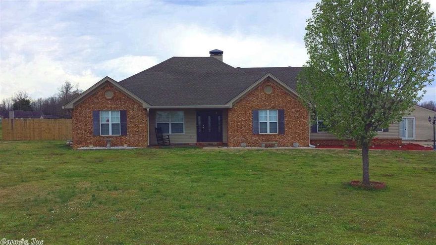You can't jump from one roof to another in this subdivision unless you are superman! This is country living with elbow room! 3 Bedrooms 2 baths, open floor plan with a wood burning fireplace! The mstr bath is awesome! Huge 600 sqft, detached bonus room shop (insulated) currently being used as a 'man-cave' but could be a shop, playroom, craft room or art studio. There is a new storm shelter in the back yard as well as an extended patio with a fire pit. New energy saving hot water heater. Well maintained!