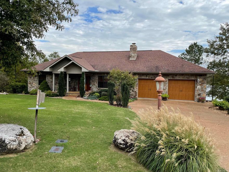 Spacious waterfront home on Crown Lake! Nestled in the Ozark mountains with an abundance of outdoor activities nearby. Float the river, explore caverns, play a round of golf at Turkey Mountain. Enjoy fishing, swimming, boating, skiing, or just take in the gorgeous view from your back deck or screened in porch. Upper level boasts a living/kitchen/dining combo as well as 2 bedrooms and 2 baths. Downstairs you will find another large, open living area, 2 additional bedrooms, and plenty of storage. It is the perfect home for entertaining. Located at the end of a quiet cul-de-sac with only 2 other homes. Nice boat dock with boat lift.