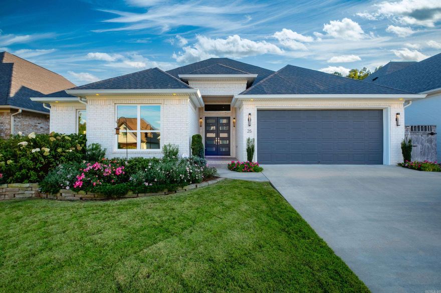 Step inside this custom-built 4-bedroom, 2.5-bath home, where natural light fills every corner of the open living, dining, & kitchen areas. Designed with comfort, function, and style in mind.  The primary suite features 2 spacious closets & a spa-inspired ensuite bath with a curbless wheelchair-accessible shower and soaking tub.  The secondary bedrooms share a well-appointed pass through bathroom, offering both convenience and privacy.  Enjoy year-round outdoor living on the covered patio with a fireplace, overlooking the lushly landscaped, fully fenced backyard that backs to a tranquil green space for added privacy.  Every detail reflects thoughtful craftsmanship—from the hydraulic TV mount and custom-selected countertops to the built-ins that elevate the home’s character. Other highlights include a walk-up attic, wide doorways, custom window blinds for light control, and a dedicated space for an additional refrigerator.  Located within walking distance of Don Roberts Elem & just minutes from several top-rated public & private schools, this home offers the perfect blend of luxury, livability, & location.