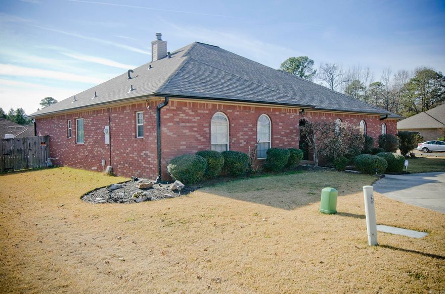 Are you looking for a 4 bedroom, (2 are masters), 3 bath AND a 4 car garage? This is it!  Vaulted ceiling and gas log fireplace are featured in the spacious living room. The house has fresh paint, tasteful new fixtures, new dishwasher and sink. There's a walk in pantry and new custom shower in primary bath. The fully fenced backyard has a covered patio with a gas hookup for enjoying the outdoors, cooking those fun barbecues and swimming in the 2 year old above ground pool with a brand new fully warrantied liner. There's a sprinkler system too. Roof is 2023. Entertain a lot? Have a large family? The circular driveway and corner lot help with parking. The attached garage is an oversized 3 car with a storage room. Then there is a detached 1 car currently used as a work out room. Great neighborhood to walk.