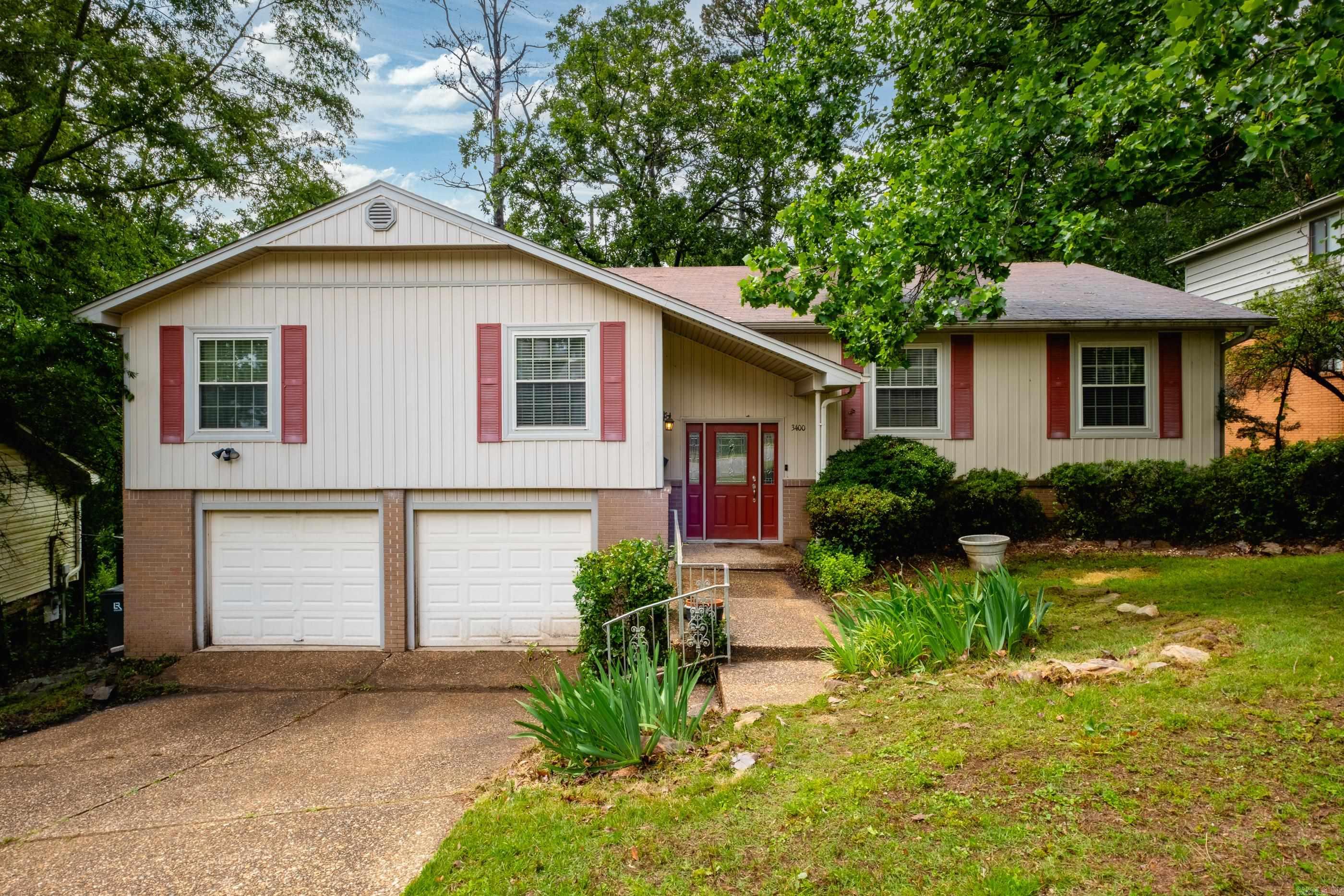 Come see this spacious and updated 4 bedrooms/2.5 bath home in Echo Valley! Upstairs has hardwood flooring, two living areas, formal dining, eat-in kitchen, all four bedrooms and two full baths. Kitchen has double ovens, built-in microwave, abundant counterspace and separate pantry. Primary bedroom has double closets and beautifully tiled walk-in shower. Downstairs is a large walk-in laundry room, storage closet, bonus room, half bathroom, access to garage, crawl space and exterior doors leading to back lower deck. Updates include newer windows, water heater 2021, and HVAC less than six years old. Refrigerator stays. See agent remarks.