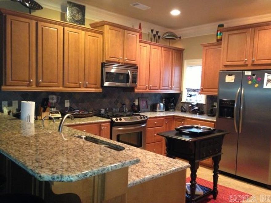 Fully Furnished Luxury Condo on Lake Hamilton just off Central Ave and close to shopping and restaurants and Oaklawn! All you need is your  toothbrush! Walk-out unit is only 25' from Lake! Granite Counters in Kitchen and full SS appliance pkg including fridge and separate icemaker by sink! Fireplace has gal logs and 8x32' covered balcony with access from master Br and Living Room! Tall Ceilings with crown mold throughout and open floor plan. 2 Br and 2.5 baths. 6 months lease. All Utilities pd!  $1395/mo.