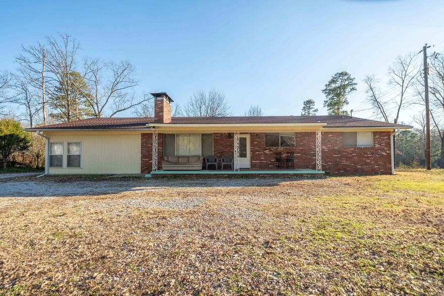 Move in Ready, freshly remodeled, four bedroom, three bathrooms on 3.5 acres, privacy fenced back yard, split floor plan, new wiring, new plumbing, new kitchen with custom cabinets, granite counter tops, and stainless appliances, completely updated bathrooms, new vinyl plank and new carpet, new ceiling fans, new roof, new insulation, new hot water heater, too much too list, running creek at back of property which flows into Lake Hamilton! Enjoy access to kayaking from your back yard! A must see! Lake Hamilton Schools.
