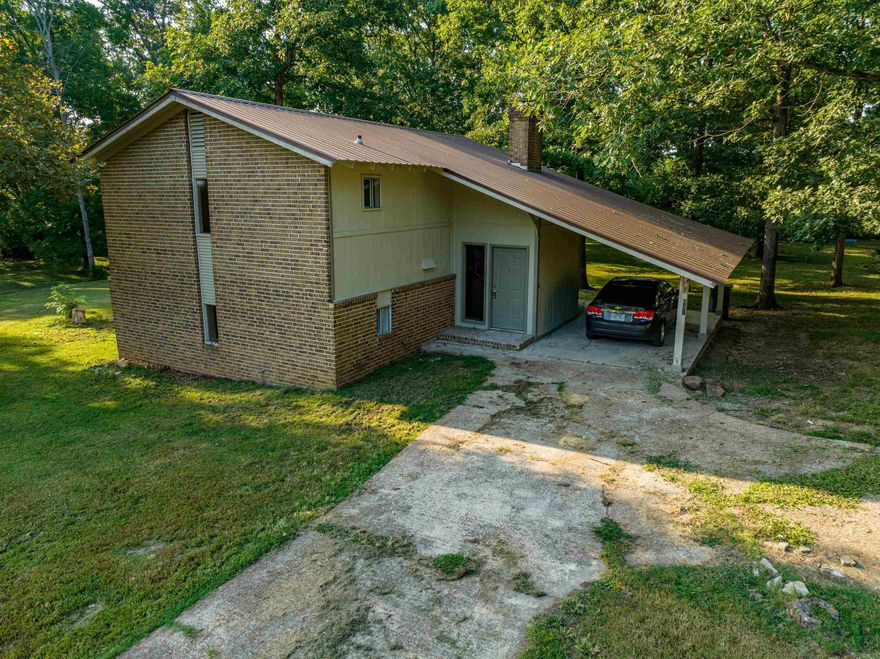 This is a nice, remodeled home with 4 bedrooms, two baths, a fireplace, new central heat and air, new kitchen cabinets and countertops, new flooring throughout, new bathrooms including tub/showers, toilets, and vanities, redone stairs, new sliding glass doors leading out to a patio area off the kitchen, new fixtures for lights and ceiling fans, new paint on inside and outside of house along with a shed out back.  This home has 2 lots and some fencing for your pets.  This home sits in a great neighborhood between Batesville and Cave City, Arkansas!  When you come into this home, you will have stairs going down to a living room, kitchen, master bedroom, and bathroom.  You have three bedrooms, a bathroom, and a washer and dryer area up the stairs!  This home has over 1700 sq ft under a roof that is heated and cooled.  Move-in ready home! Seller will put in NEW stove and refrigerator prior to closing.