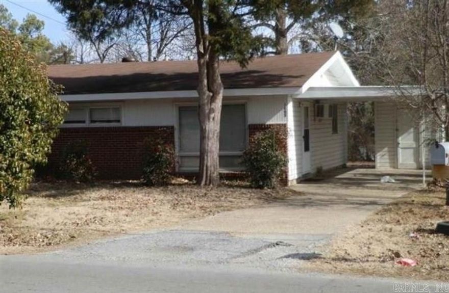 Brick and frame house located close to schools and churches. Shaded backyard is enclosed by privacy hedge. AC/heat window unit and gas wall furnace for heating and cooling. Tenant pays all utilities. No pets. Not on HUD Section 8. Apply with property manager at listing office.