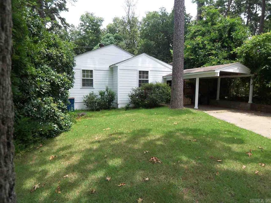 Fantastic opportunity to redo a cute Cammack house!  And only $125,000!  This is an estate, so house is being sold as is.  Cute outside w fresh paint & lawn sprinkler system!  Inside needs updating.  2brs & 2 full baths.  ~300sf of unfinished space for 3rd bedroom, laundry, etc.  Good floorplan.  Hardwood floors, living rm, dining rm, "hearth room" off kitchen, carport.  Has central heating.  Private fenced back yard.  Excellent investor home.