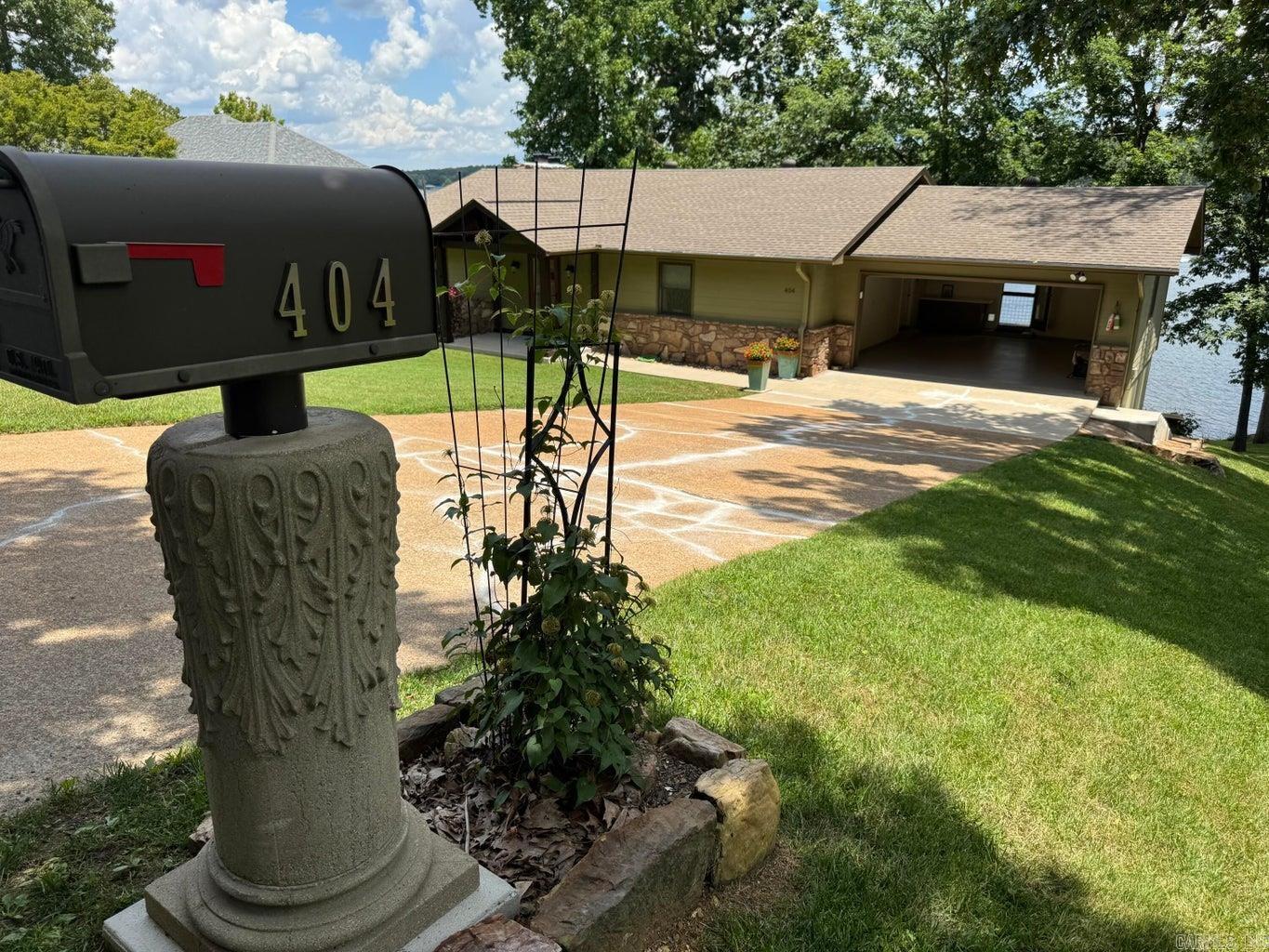 Enjoy the spectacular views at this 3 bedroom 2 bath Crown Lake front home that has been completely updated so all you have to do is bring your bags and move right in! As you open the front door you are greeted by the lake views. The main level features an open floor plan, large bedrooms, living room with a gas fireplace, kitchen and laundry. The kitchen has custom cabinets with granite countertops and a good sized pantry. The kitchen bar and the bannister has been make with wood from a 1890's New York church. The downstairs bedroom has a built in bed with its own porthole window that opens to catch the breeze. A large downstairs den has a wood stove for those chilly evenings, and custom made gated liquor cabinet right off the den. The 166 ft lake frontage lot is landscaped beautifully.