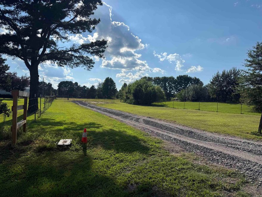 Great level lot with Water, Electric and Septic on the property. This site would be perfect for a mobile or building a new home in the 800-1200 sq foot range. The lot is fenced on 3 sides and is ready to go. Check it out today!