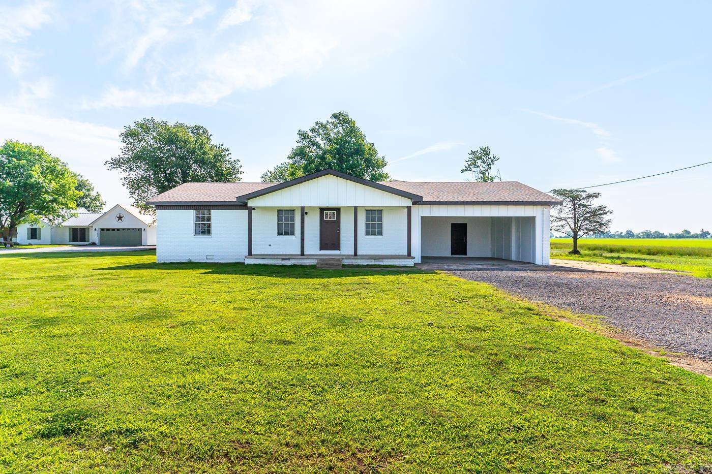 Welcome to Market 11264 Maple Grove Ln, Trumann Arkansas. Your country oasis awaits with this 3 Bedroom 1.5 Bath home that sits on just under an acre. This home features a brand new kitchen, new light fixtures, flooring, paint and so much more. This homes has a formal living room and den area!! Perfect for hosting. A brand new garage door was just installed (not pictured) The 0.79 acre lot gives you enough room for endless possibilities. Around the back of the home you will find a gazebo that matches the home!! Call today to see this home!