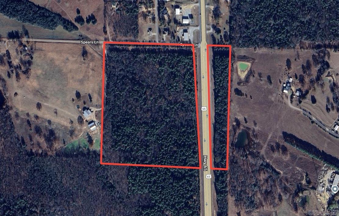 Great opportunity to own 30.03 acres of wooded land just north of Greenbrier on Spears Lane. This unique property includes 25.08 acres on the west side of Hwy 65 and 4.95 acres on the east side, offering flexibility for development, investment, or a private estate. A seasonal creek runs through the center of the tract, enhancing the natural beauty and providing a peaceful setting. The land is heavily wooded, offering privacy and a scenic backdrop ideal for a custom home or future subdivision. Located just 20 minutes from Interstate 40 and just 40 Mins from Greers Ferry Lake, this property offers the perfect balance of seclusion and convenience, with easy access to Greenbrier and surrounding areas. This tract offers excellent residential development potential or space to build your dream home in a desirable and growing area. With highway frontage, wooded acreage, and natural water features, this is a rare find in Faulkner County. Can also be subdivided into 25.08 acres tract and 4.95 acre tract NO MINERAL RIGHTS CONVEY