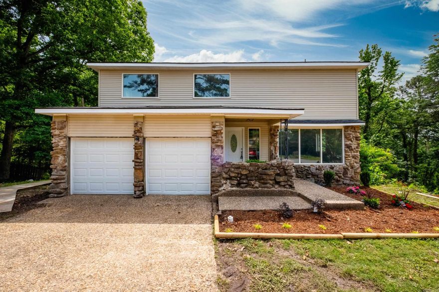 This home is essentially brand-new! The roof, windows, doors, flooring, cabinets, countertop, vanities, toilets, showers, garage doors, HVAC systems (2), water heater, deck, and electrical service are all brand new!   The appliances are new and will convey to the new buyer!   This home features two principal suites on the top floor, each with its own private bathroom and private balcony. All three balcony doors are fully slide-to-open, really opening up the space and airflow.  In total, there are 4 bedrooms, 3 full bathrooms, and a half bathroom for guests on the main floor. The 2,364 sqft goes a long way in this home!  The deck is a 3-story masterpiece with access to the very large basement that features new subflooring. Perfect for a shop, a game room, extra storage, or any other accommodation!   The brand-new tall windows throughout the home fill the space with natural light.  Schedule your tour today! You don't want to miss out on this one!   See agent remarks.