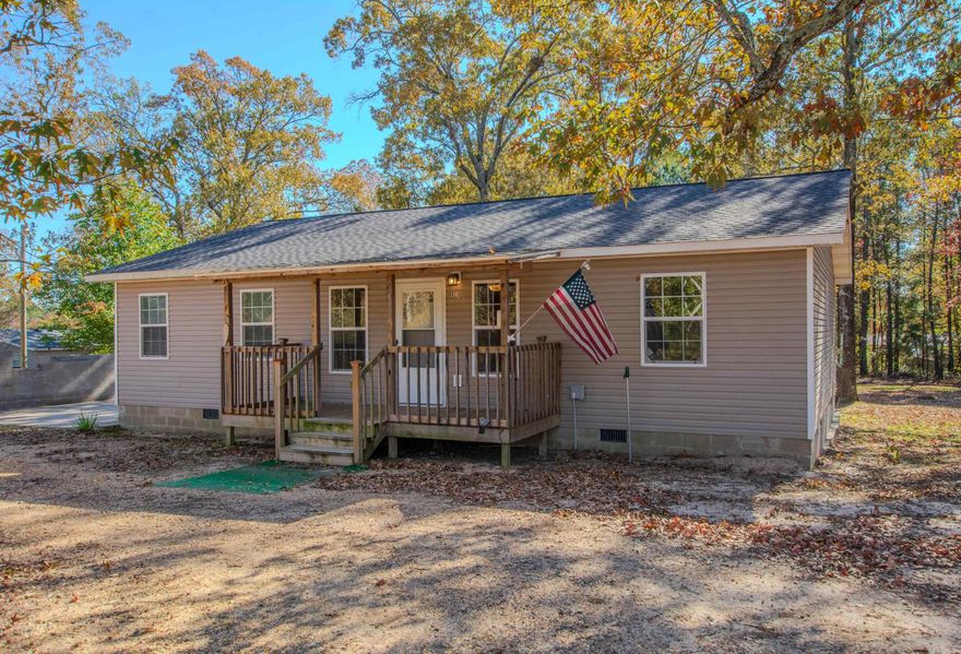 Country Charm Meets Modern Comfort! Built in 2020, this beautiful 3-bedroom, 2-bath home sits on 1.72 serene acres, offering the perfect blend of peaceful country living and contemporary style. Step inside to an open floor plan filled with natural light and canned lighting throughout. The kitchen features granite countertops, ample storage, and a seamless flow into the living and dining areas — ideal for both entertaining and everyday life.  You’ll love the spacious primary suite with a split floor plan for added privacy, featuring a soaking tub, separate shower, and double vanity. The huge utility room provides plenty of space for organization and functionality.  Enjoy quiet mornings on the front porch or unwind in the evenings on the back porch, taking in the tranquil country views. This property offers room to breathe, room to grow, and room to relax — all while maintaining modern conveniences.   Come experience the perfect mix of serenity and style — your country retreat awaits!
