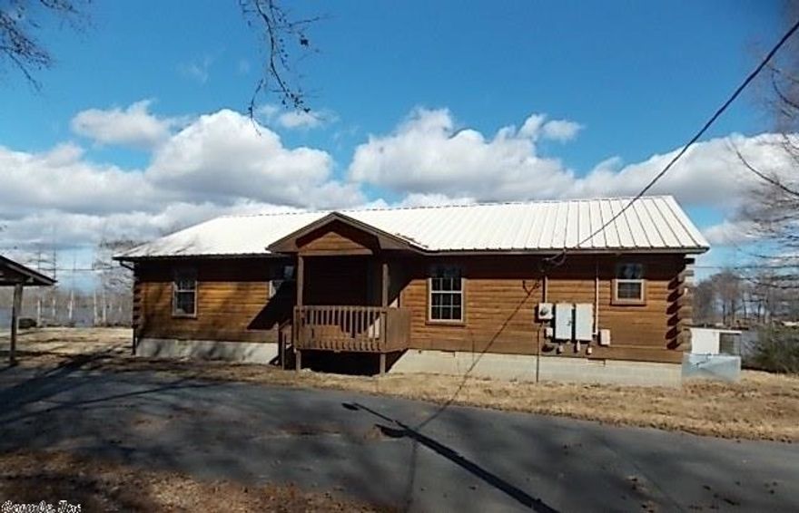 Panoramic Lake View. custom lake front log cabin. Features 2 bedrooms, 2 baths, open floor plan, fireplace and lots of lake frontage.  Move-in ready! Seller does not pay customary closing costs: including title policy, escrow fees, survey or transfer fees. Proof of funds required on cash transactions; Lender Pre-Approval letter for financed offers (dated within last 30 days). VA Offer form attached and must be used for all offers. Seller DOES NOT accept digital Signatures.