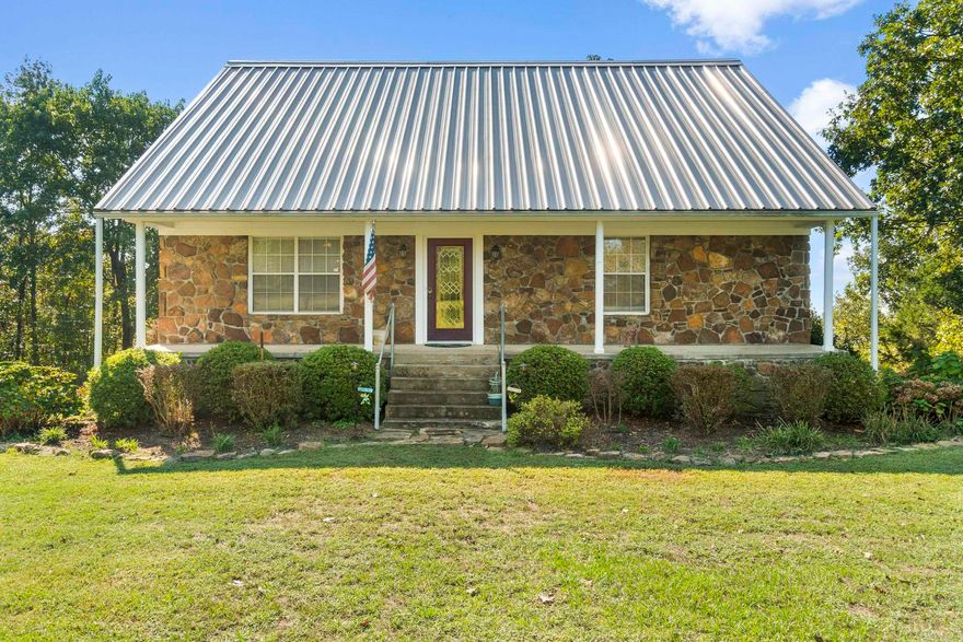 One-owner, custom-built three-story rock home featuring 3 spacious bedrooms, 3 full bathrooms. This property offers plenty of room for both relaxation and recreation, including a small game room, a safe room on the lowest level, and multiple living spaces filled with natural light, plus outdoor elevator.  Nestled on 8.32 acres, the land provides a wonderful balance of cleared yard with established garden areas and a wooded downslope for added privacy and natural beauty. A shop on the property offers ample storage and utility space.  Whether you’re looking for a serene homestead, a family retreat, or a place with room to grow, this unique property blends comfort, security, and outdoor living in a peaceful Pangburn, Arkansas setting.