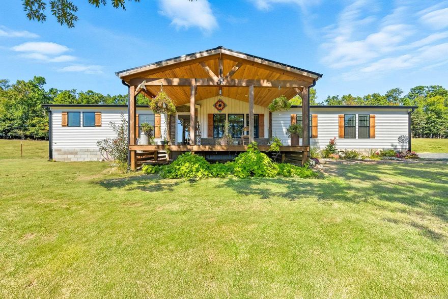 46.15-acre farm, featuring a 3BR/2BA custom home with 2280sq.ft, plus a 20x30 cabin, 50x40 insulated barn, concrete floors, electrical, with sheds on both sides of the barn. The farm includes cross-fencing, corrals, chicken coop, dog kennel, four ponds, three pastures, and a year-round creek. These features allow for rotational grazing and can accommodate 45-50 cattle.  The home offers a spacious living room with fireplace, office, gourmet kitchen, primary suite with soaking tub, tile shower, and walk-in closet.  Covered front and back porches provide views of rolling pastureland.  Property is close to Shady Lake, Cossatot River, Caddo River and Lake Greeson all excellent for camping, hunting, and fishing.  This exceptional farm offers everything you need for a productive homestead, working cattle farm, or private country retreat.