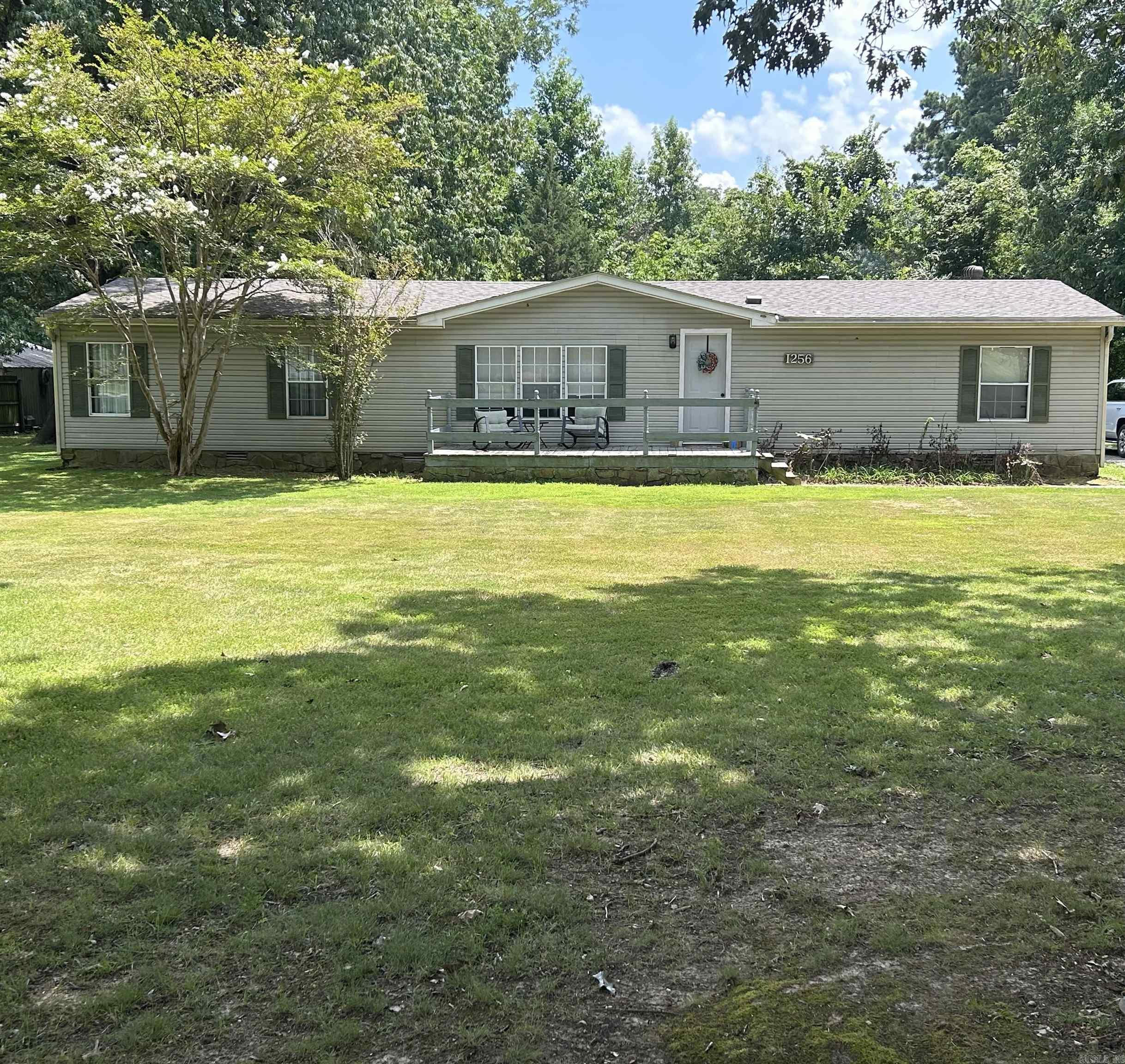 Check out this charming 3 bedroom, 2 bathroom mobile home. With big bedrooms, a beautiful yard and a nice deck, this home is perfect for that peaceful lifestyle you have been seeking. *3 spacious bedrooms. * 2 bathrooms for added convivence. *Large deck for relaxing, BBQs, outdoor gatherings, or just enjoying the outdoors. * Close to Heritage Park and other local amenities. * Exquisite light fixtures. *Nice flooring. *Immaculate closet space. * Remodeled primary suite bathroom. * Newer roof (less than two years old)