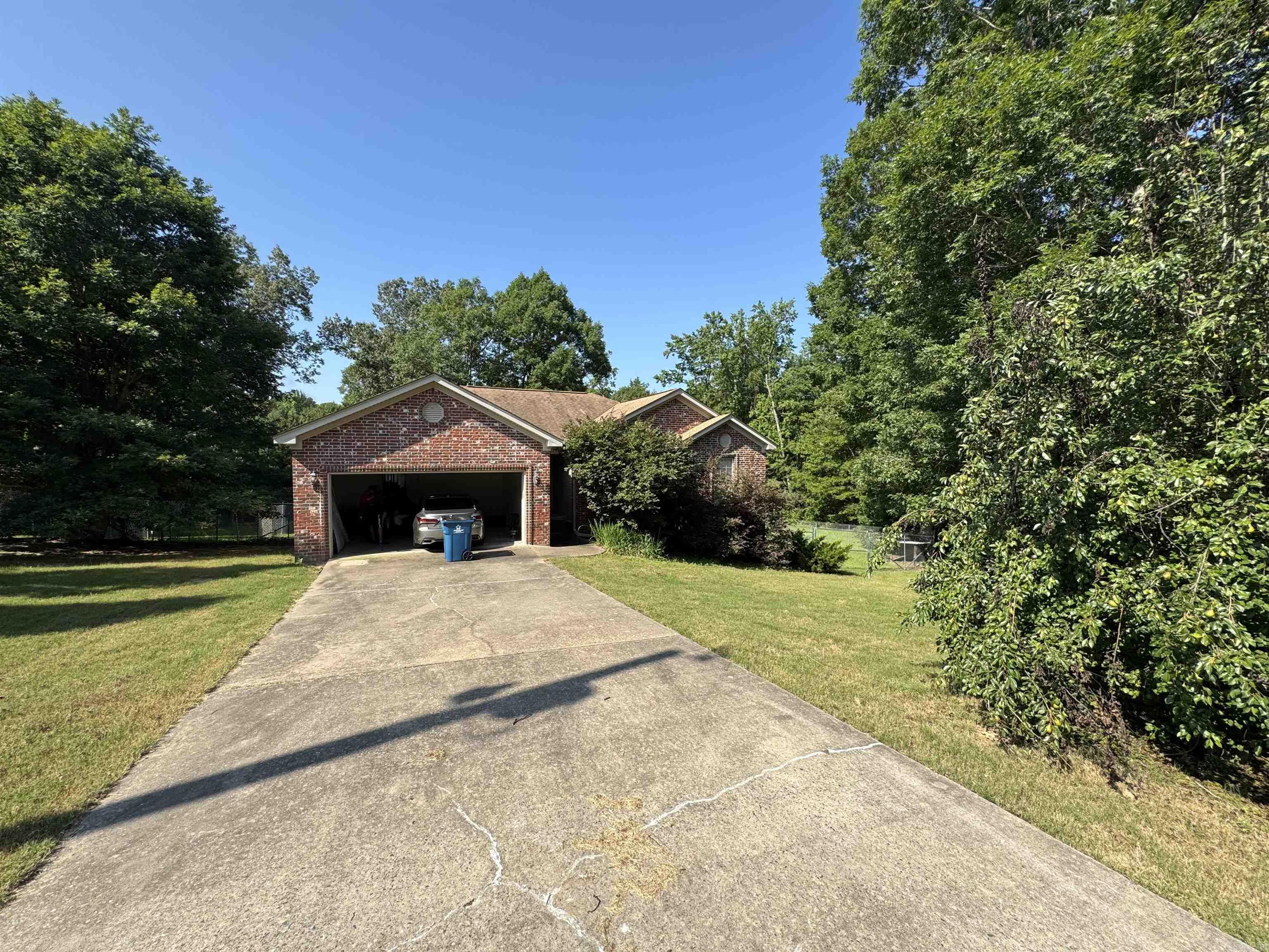 Come and check out this lovely home! It sits on 1.38 acres yet still you have your privacy with the backyard fully fenced that's spacious. It also has a stand alone garage for parking! Schedule your tour, today!