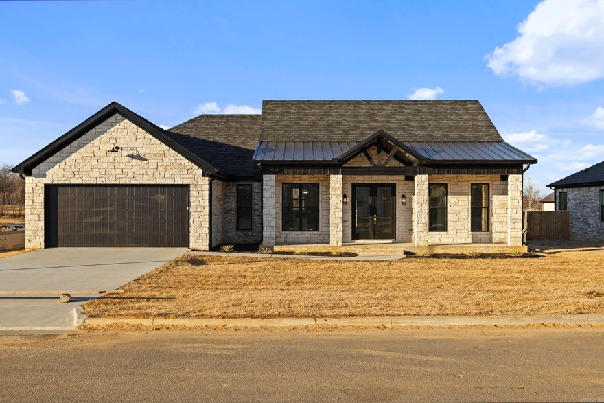 Experience elevated living in this one-of-a-kind luxury new construction. This 4BR/2.5BA home offers a desirable split floor plan with open-concept design and engineered hardwood flooring throughout—no carpet. The chef’s kitchen features a spacious center island with abundant cabinetry and dedicated microwave storage, soft-close drawers and cabinets, under-cabinet lighting, and a huge walk-in pantry. Designer tile accents the half bath and utility room. Added premium touches include a built-in mud bench and an oversized laundry room with extensive cabinetry and counter space.The private primary suite is the epitome of luxury with a supersized walk-in closet and beautifully designed bathroom. Enjoy outdoor living on the covered back patio overlooking the fully fenced backyard. This home is constructed with metal ductwork insulated with spray-on polyethylene for airtight application (no flex ductwork), real limestone exterior, premium 50-year architectural shingles with lifetime warranty, and a metal roof for superior durability. Refrigerator conveys. Located in a Rural Development eligible area. Schedule your private showing today!