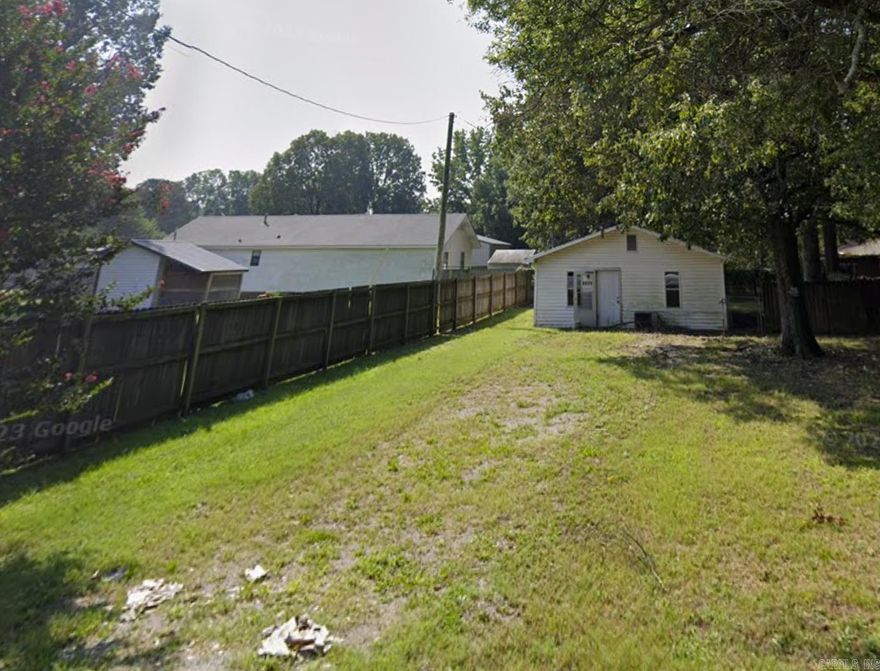 Two adjoining lots sold separately - 1404 Cole St & 710 N 15th Ave MLS #25015533. Attention all investors, flippers, and builders! 1404 Cole St features a .14 acre lot with a small home with fire damage being sold as-is perfect for a full renovation or tear down. If you purchase both this and the adjoining lot 710 N 15th Ave you get the rare opportunity for a half-acre corner lot. The possibilities are endless for this high potential investment.  Agents see remarks. SPD in docs.