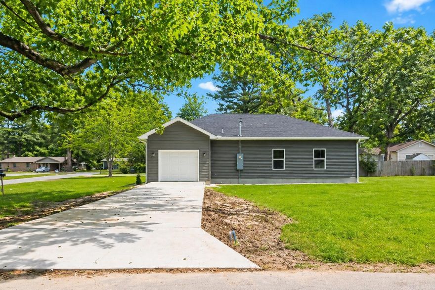 Come and tour this 3 bd. 2 ba. Brand new, new construction home with an open floorplan. It has soaring ceilings, granite countertops, luxury vinyl flooring, custom cabinets, and more! You'll just love the gorgeous heat producing LED fireplace. The tall windows gives a more bright modern look with beautiful lighting. It features a separate laundry room, spacious bedrooms, and custom closets. You'll love the unique fixtures throughout the home. It also features a master bedroom suite and bathroom with a luxurious walk-in shower with seating. It also has a custom built spacious walk-in closet. This beautiful home sits on the corner with a oversized lot for plenty of space for entertaining family and summer bbq's. The neighborhood is peaceful and quiet and it's only a couple of minutes from Heritage Park and has easy access to the highway. This home is move-in ready. Call or text listing agent today to take a tour. Don't miss this opportunity! It won't last long!  **Agents check remarks.  Some photos have been enhanced with AI to provide better lighting.