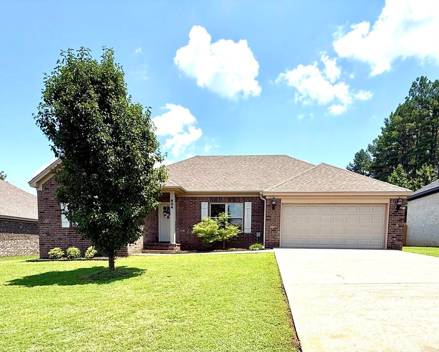 Welcome home to this updated 4-bedroom gem, perfectly located on the desirable west side of Searcy. This beautiful brick home offers stylish living with a thoughtful layout — including a private primary suite, separated for added comfort and retreat. Step into the open-concept kitchen and dining area, where white cabinetry, stainless steel appliances, granite countertops, and neutral paint tones create a bright, welcoming space. Both bathrooms have granite countertops and primary has a wonderful walk-in closet and tray ceiling. Easy to care for flooring flows throughout the home, combining practicality with modern appeal. Enjoy peaceful mornings or relaxing evenings on the covered back deck, perfect for entertaining or simply unwinding. Two-car garage and fully fenced!! Agents see remarks!