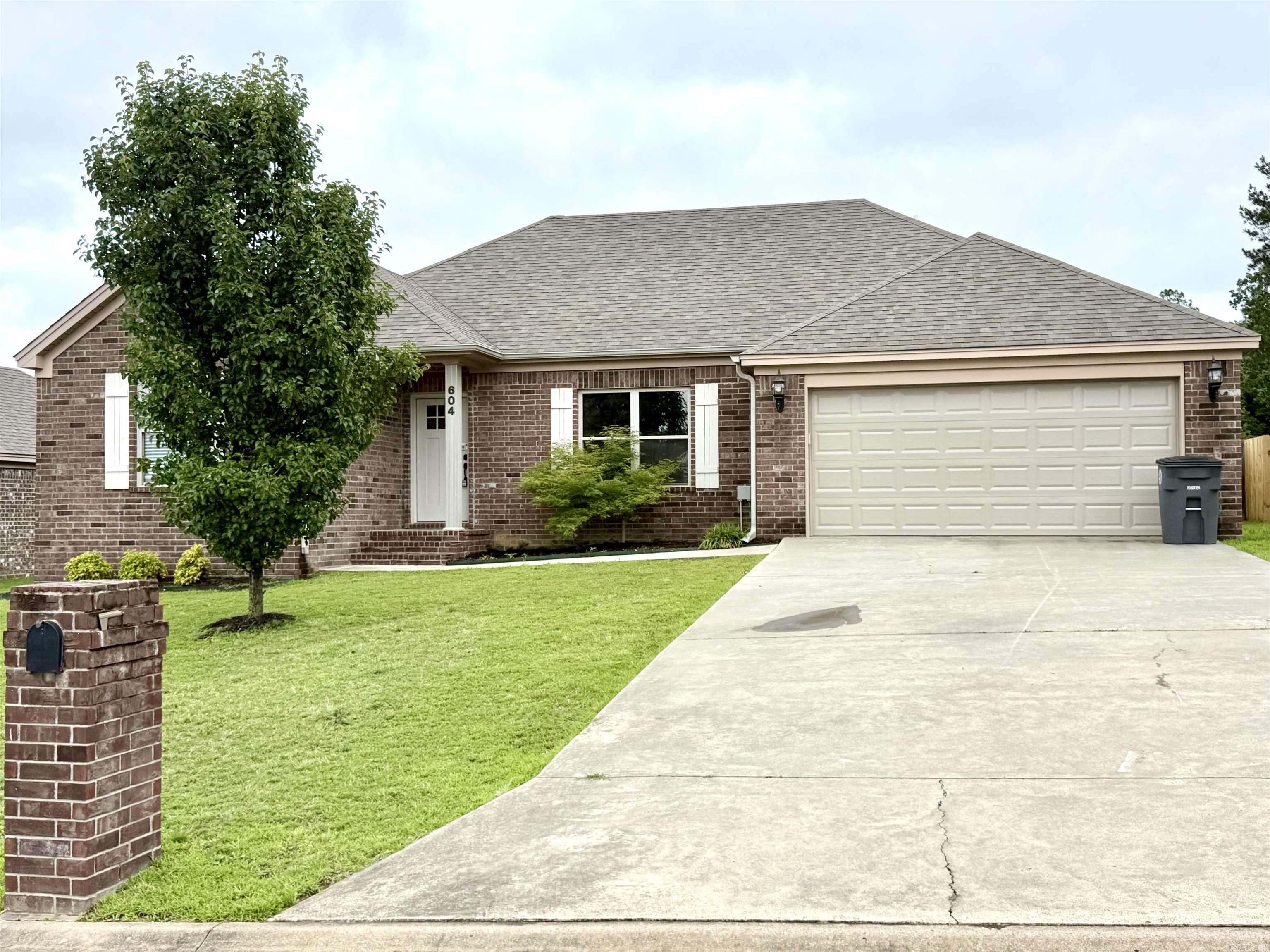 Welcome home to this updated 4-bedroom gem, perfectly located on the desirable west side of Searcy. This beautiful brick home offers stylish living with a thoughtful layout — including a private primary suite, separated for added comfort and retreat. Step into the open-concept kitchen and dining area, where white cabinetry, stainless steel appliances, granite countertops, and neutral paint tones create a bright, welcoming space. Both bathrooms have granite countertops and primary has a wonderful walk-in closet and tray ceiling. Easy to care for flooring flows throughout the home, combining practicality with modern appeal. Enjoy peaceful mornings or relaxing evenings on the covered back deck, perfect for entertaining or simply unwinding. Two-car garage and fully fenced!! Agents see remarks!