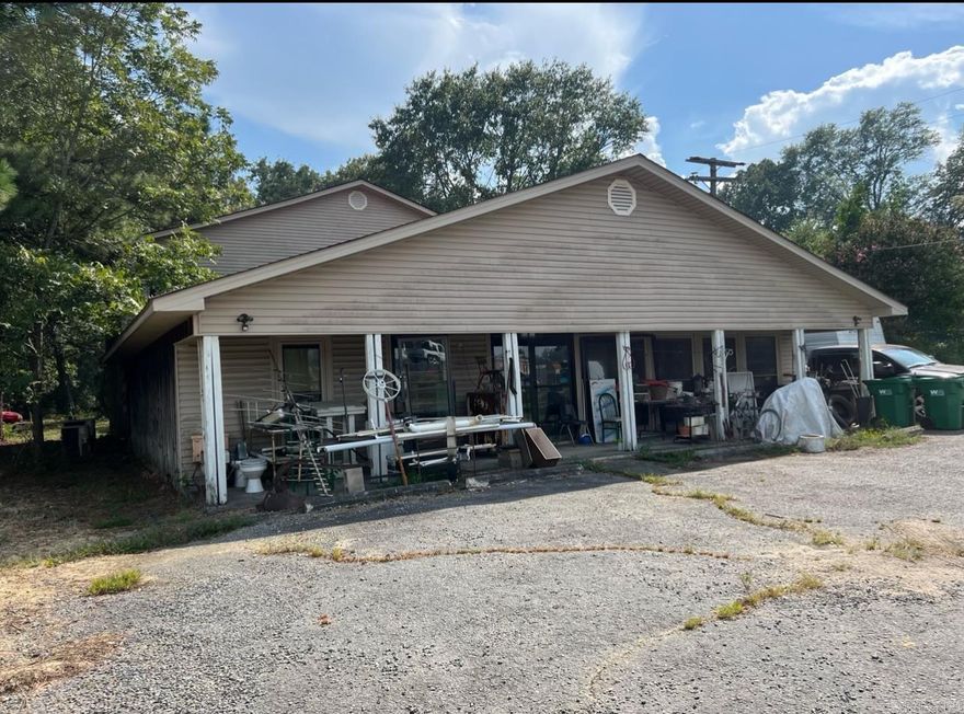Great property that can zoned commercial. This property includes a rent house that is currently being rented, a large warehouse with living quarters and a rv park with 9 spaces.