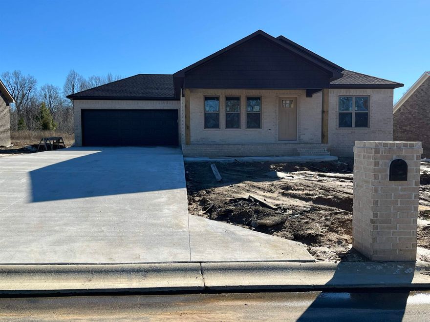 Check out this modern farmhouse style- new construction home in Ridge Park subdivision! This home has a one of a kind curb appeal with the garage tucked back and a large front porch. As you walk in from the garage, the kitchen overlooks the living area that is the perfect size for having family and friends over! The kitchen offers great cabinet space, will have granite countertops, stainless appliances, and a breakfast bar. The split floor plan has 2 bedrooms and 1 bath on one side of the house with the master suite having a more private feel. The master has a walk in closet with a large vanity in the bathroom. This home also has a covered back porch and a nice backyard. Call today before this one is gone!