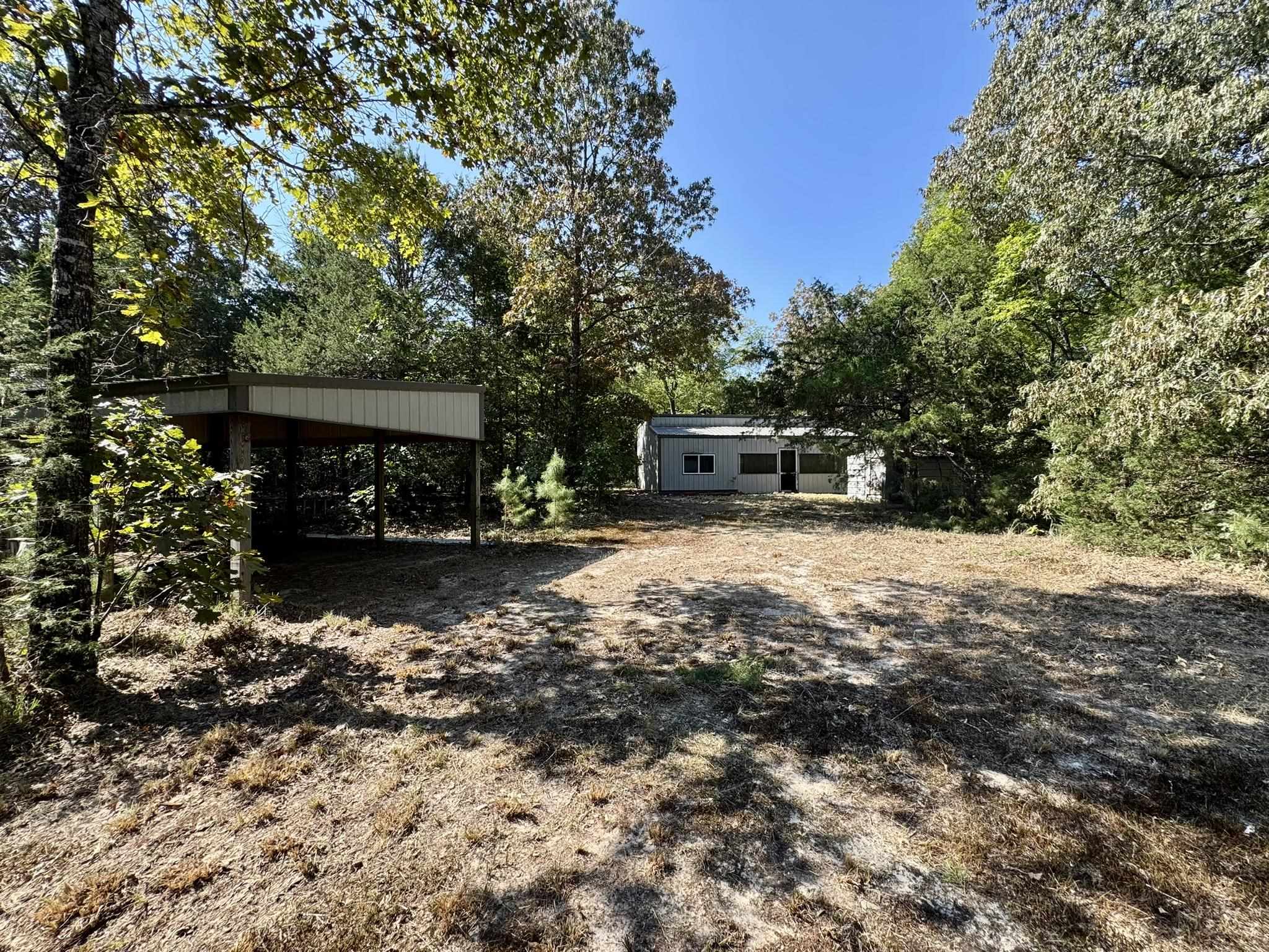 Discover the perfect blend of privacy, recreation, and potential with this barndominium-style cabin on 40 acres for sale in Violet Hill, Arkansas. This one-room cabin features a screened-in porch and sits on land that is mostly wooded with a mix of hardwoods and pines. The property also has a partially fenced spot for gardening, a pond, and electricity already on-siteāmaking it ideal for a hobby farm, weekend retreat, or full-time homestead. This Arkansas hunting land offers excellent opportunities for outdoor enthusiasts, with abundant wildlife including bear, turkey, quail, dove, and whitetail deer. Located on a dead end road, youāll enjoy unmatched privacy and true Ozark seclusion while still being within reach of small-town amenities. Whether youāre looking for a recreational getaway, hunting cabin, or a place to build your dream hobby farm, this affordable barndominium in Violet Hill, AR has endless possibilities. Priced at only $119,900, itās a rare opportunity to own your own slice of the Ozarks.