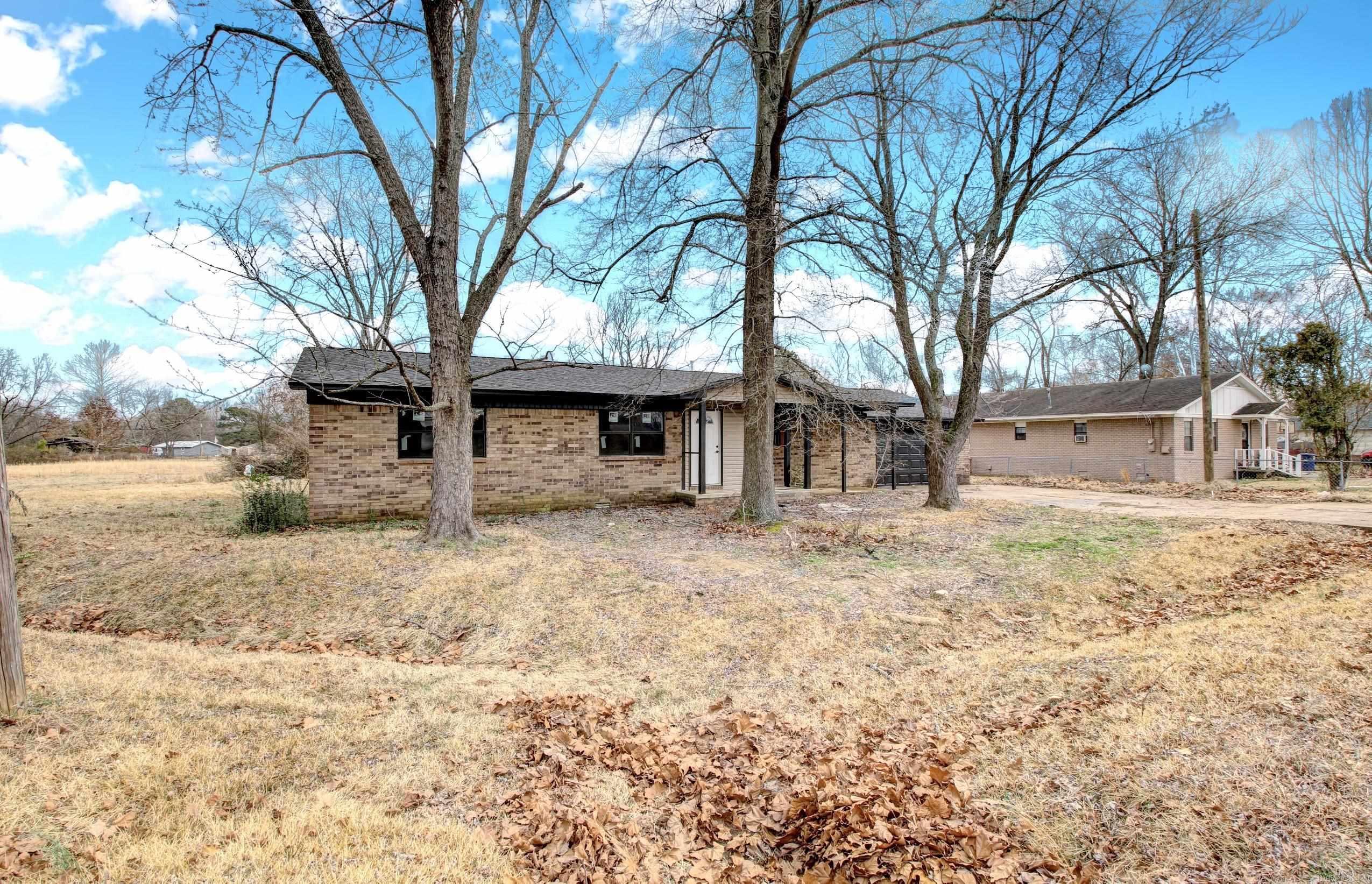 Welcome to 204 N Apple in Beebe, AR! This beautifully remodeled home offers 3 spacious bedrooms and 2 full bathrooms, providing the perfect blend of modern updates and timeless charm. With over 1,900 sq ft of living space, this home has been meticulously renovated to meet all your needs. Situated on 1.22 acres, you'll enjoy plenty of room to spread out, whether you're relaxing in the large backyard or entertaining guests. The open-concept layout boasts a stylish kitchen with brand-new appliances, stunning countertops, and plenty of storage space, seamlessly flowing into the living and dining areas. Both bathrooms are completely updated with elegant finishes, while the bedrooms offer ample space and natural light. This is the perfect combination of country living and modern comfort. Donāt miss out on making this your new home! *** Seller is willing to pay buyers closing costs***
