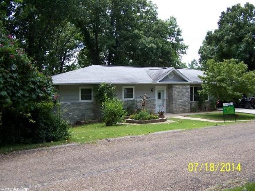 Lovely 3 BR, 2 BA. Don't worry about the little things; just watch the deer every evening off your private relaxing deck.  This is a real winner for new home buyers. The upgrades are numerous.  Vinyl tilt-in windows, added blown in Ins 8", new Trane heat pump 16 Seer '08, new insulated garage door 2012, new carport '09, new gutters & downspouts '09, septic tank cleaned '07, new roof '04.  Gorgeous newer jacuzzi in master bath with cultured marble surround. Awesome refrigerator with drawers is staying.