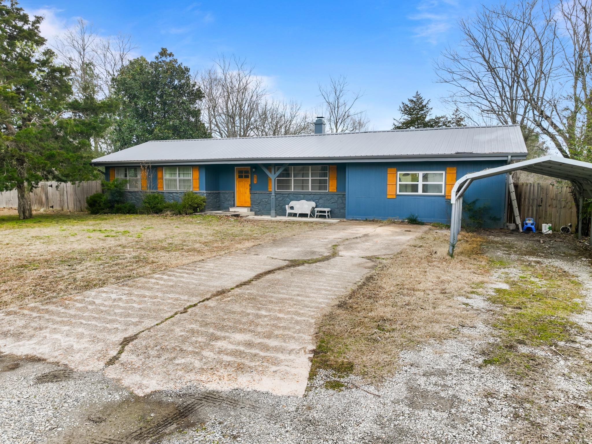 Looking for a cozy home with room to play? This 4-bedroom, 2-bathroom charmer sits just 4 minutes south of the Hwy 62/14 junction in Yellville, offering convenience with a touch of country living. Minutes from the grocery store and the Buffalo River, you get the best of both worlds. The split floor plan gives everyone their own space, while the updated bathrooms and spacious kitchen, loaded with cabinets and counter space, make everyday living easy. Outside, you'll find a .78-acre yard, mostly fenced with a privacy fence in the back - perfect for pets, play, or even a few chickens! Plus, with a newer metal roof, gutters, HVAC, and water heater, the big-ticket items are already taken care of. Don't miss out on this affordable, move-in-ready home - schedule your showing today!