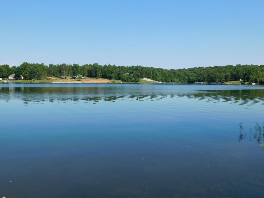 CROWN LAKE...Residential lot with all utilities available, including city sewer. Big view, great water, gentle slope, paved road, large hardwoods and easy access near fabulous amenities.