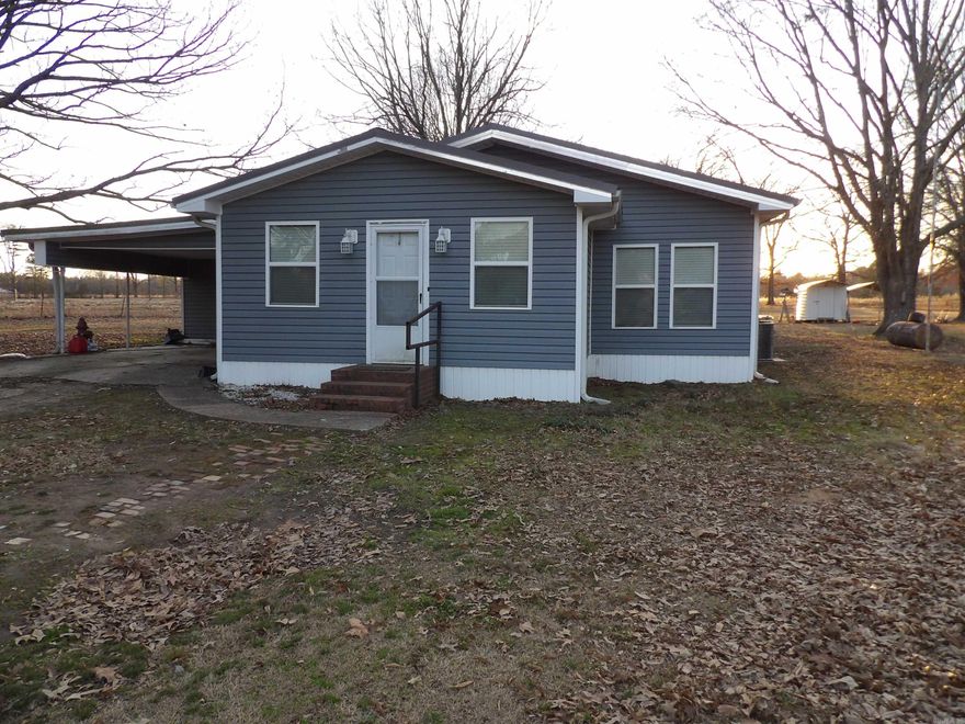 This home sits peacefully in the country on a quiet county road, offering the privacy and space that rural buyers love. Situated on 2.50 acres, the property provides plenty of room for gardening, outdoor activities, or future improvements. The home has been partially remodeled, giving you a comfortable blend of updated features and the opportunity to add your own finishing touches. Whether you're looking for a quiet retreat, a small hobby property, or a place with room to grow, this setting delivers a calm, country lifestyle with easy access to town conveniences.