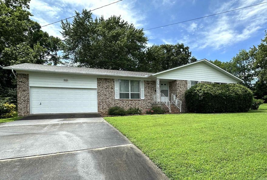Beautifully maintained brick home with many improvements. New architectural  shingles and Lennox HVAC unit 2019, New garbage disposal, exterior paint and porch screens 2025, New interior paint, flooring & electrical outlets & switches 2016. All appliances convey with the property (refrigerator, gas stove, washer & dryer).  2 spacious master bedrooms with private baths and large closets. There is an addition 1/2 BA in the hall along with more closet space.  Comfortable living room that flows into the dining/ kitchen area & separate laundry RM. Large fully fenced backyard with storm cellar, storage building and screened back porch. The garage also has addttional storage space. Sandy Beach & schools walking distance away. Don't let this one slip away, call for an appointment today!