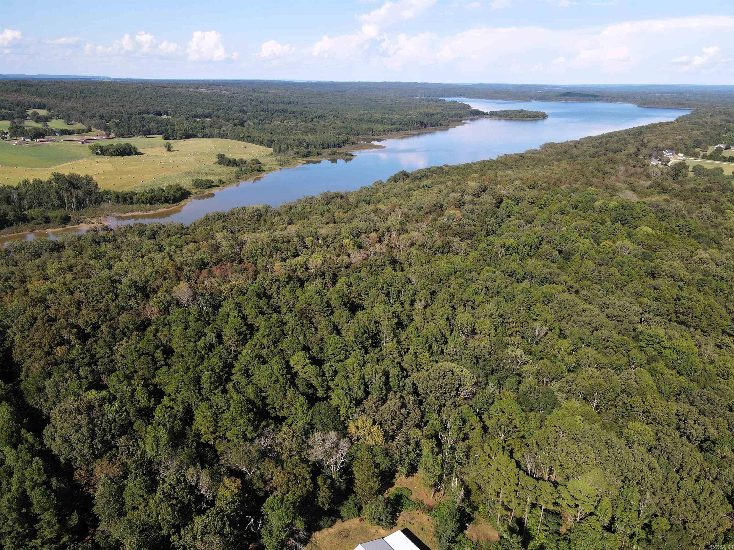 - 20 +/- acres of timber - Frontage with Brewer Lake WMA - Storm shelter - Mature mixed timber - Septic tank installed - County water - Electricity w/meter loop - Deeded easement access, gated entry - Outstanding deer, turkey, & small game hunting - 5 miles to I 40 in Plumerville - 18 miles to Conway
