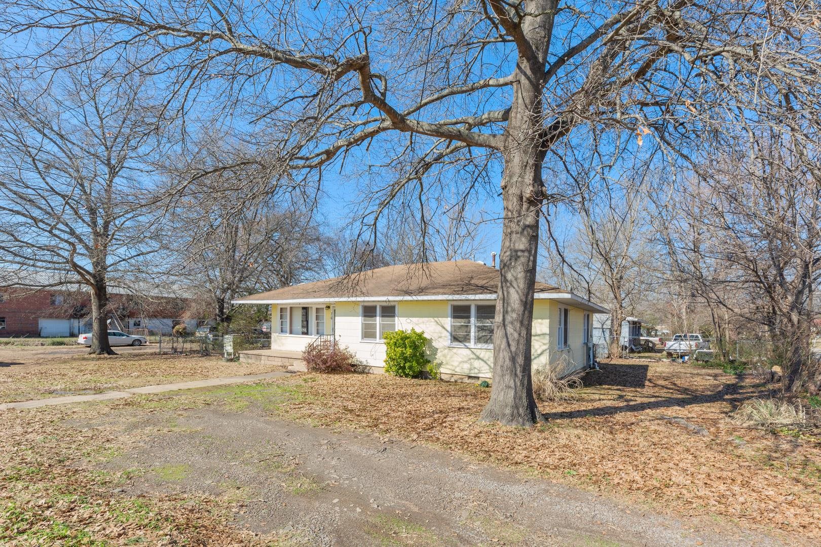 Home on a corner lot for sale with updated kitchen! This home has three bedrooms, a large updated kitchen with plenty of cabinetry and an updated bathroom too! Nice picture windows, corner lot, deck with grilling area and chain link fencing for your pet. Hardwood floors throughout except the kitchen. Great location in Waldron and priced to sell.