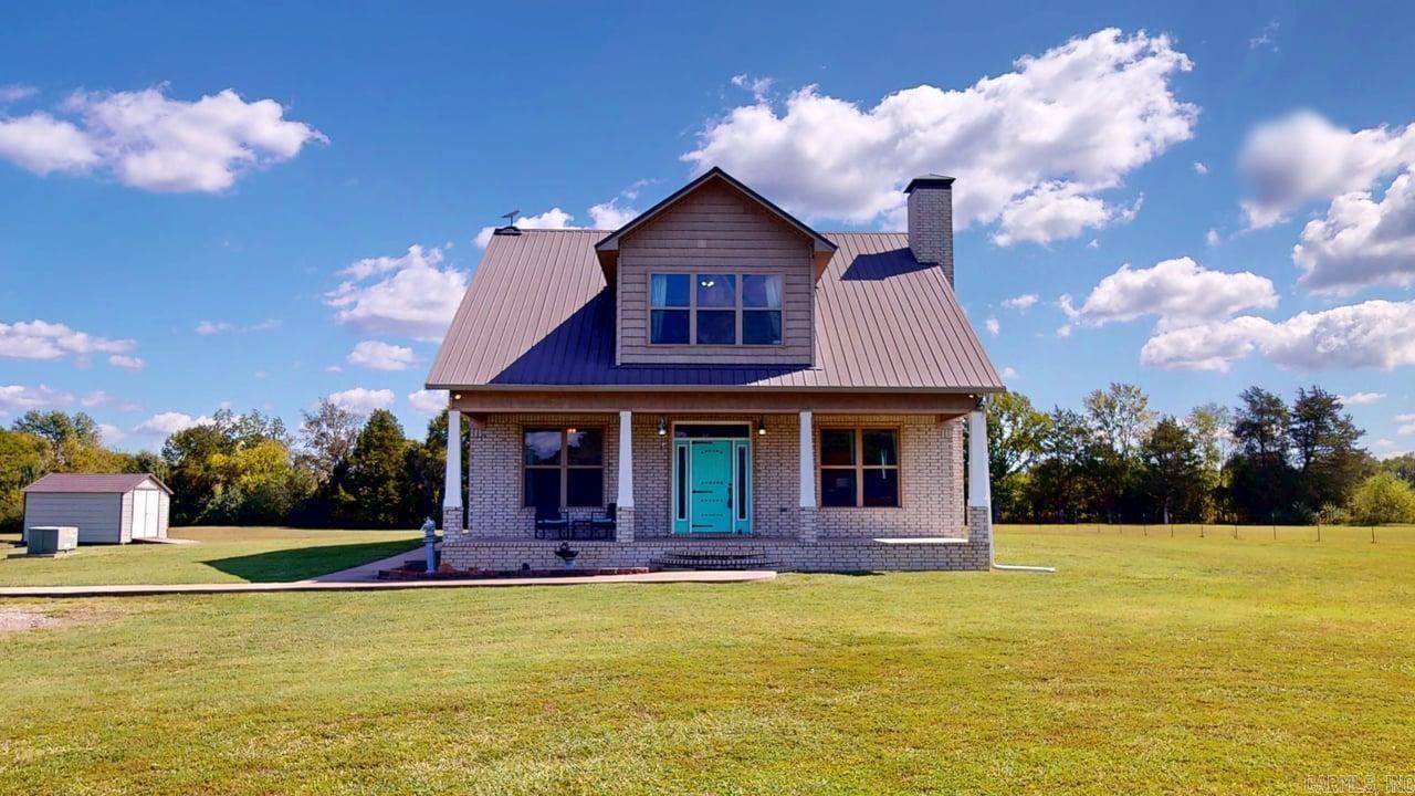 Incredible 4 bedroom 2.5 bath home that offers modern comfort and privacy with country living on 6.3 acres of land. With a covered front porch that is perfect for relaxing, you step into the home with an open concept floorplan. Large living room offering plenty of space for large gatherings with family and friends and a wood burning fireplace. Living room is open to eat in kitchen and has beautiful quartz counters, stainless steel appliances including a gas stove, a refrigerator that will convey, & a spacious walk in pantry. Primary bedroom is on the first floor with ensuite bathroom that includes walk in shower, soaking tub, private toilet closet, double vanity with gorgeous quartz counters, and large walk in closet. Separate laundry room & half bath can also be found on the first floor. Upstairs you will find three separate bedrooms and one full bathroom with walk in shower as well as walk out attic. There is incredible storage space throughout this house with spacious closets in both bedrooms and hallways. Outside is a dream with a covered back porch, pond, 12X12 building, & a practice golf course set up. There is even a spot with utilities set up for a tiny home to be built.