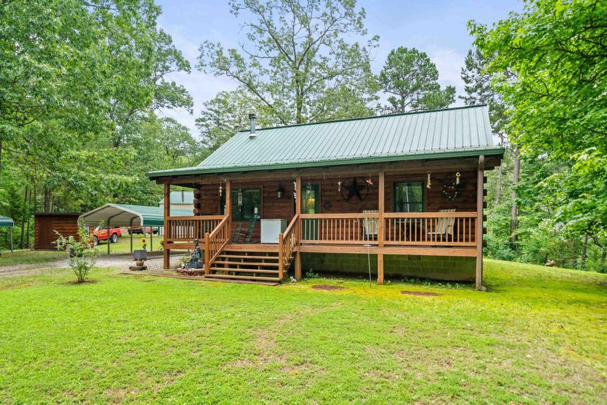A charming, log-style single-family home with metal roof, secluded and private on appx 12.4  acres in a desirable, gated subdivision. It blends rural privacy and quiet country living with easy access to Hot Springs. Comfort and cozy with a wood burning stove. Interior is all pine with  hickory built cabinets, free moving island in kitchen with all stainless appliances, loft bonus room, all electric, central heat/air,  30x40 shop, 3 free standing carports. Enjoy watching wildlife from your front porch.  Perfect relaxing getaway or permanent home! Don't miss this one! Fountain Lake Schools