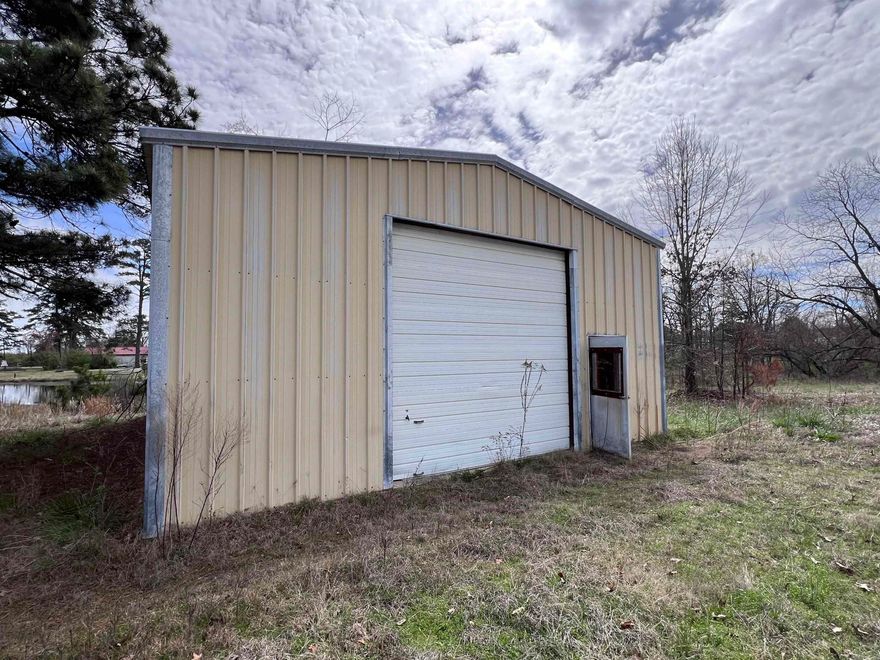 Looking for a spot for your business in a high traffic area? Here it is! 30x40 building with a roll up door and a small office area upon entry. Lots of opportunities with this one with great visibility. Call office for more information!
