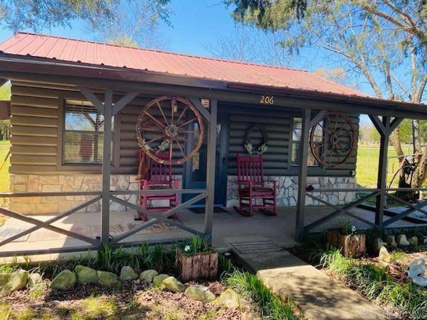 Adorable log sided cabin very close to town! Sit on the porch in your rocker looking out across a field at the wildlife must be everyone's dream, right? Well, this is for you, if it is! If not, turn this little cutie into income potential. Make this an Airbnb or monthly rental. Home was remodeled in 2015, also has an electric fireplace and is partially furnished. Give us a call for a showing today! Agents see Remarks