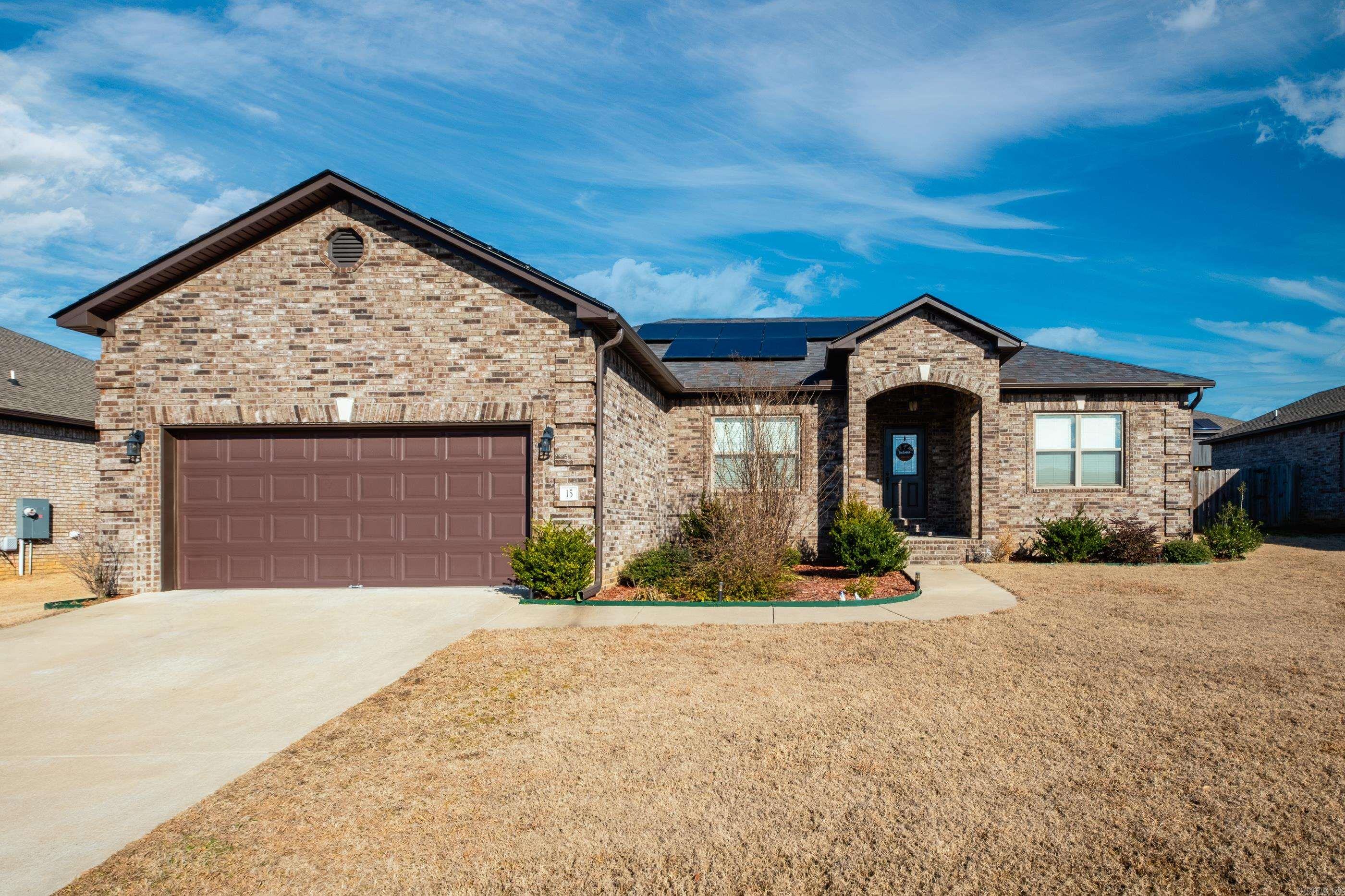 Located in the Cabot School District and local to shopping, dining and highway access! This incredible home was built in 2019, boasts 3 bedrooms, 2 full bathrooms and 1,958sq ft of living space! When you walk inside you are greeted with an open concept design, split bedroom format, tall ceilings with LED lighting, tray ceilings with wooden cross beams, luxury vinyl flooring for easy maintenance and a fireplace for cozy evenings! The kitchen is perfect for entertaining hosting guests, with granite countertops and ample cabinet space for storage! The primary bedroom is extra spacious with an ensuite bathroom that has a walk-in shower, soaking tub and walk-in closet! The guest bedrooms are very spacious, and the backyard is expansive and offers covered patio for relaxing with guests! Home qualifies for 0 Down USDA Rural Development Loan according to map. Solar panels will be paid off at closing. Schedule your tour today!